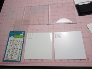 Stamping new stamps onto cd case inserts and placing on panels